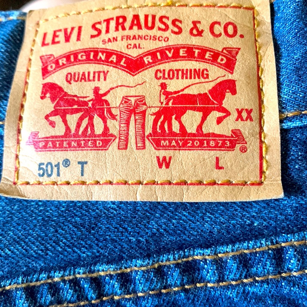 Woman’s Levi taper butterfly jeans
